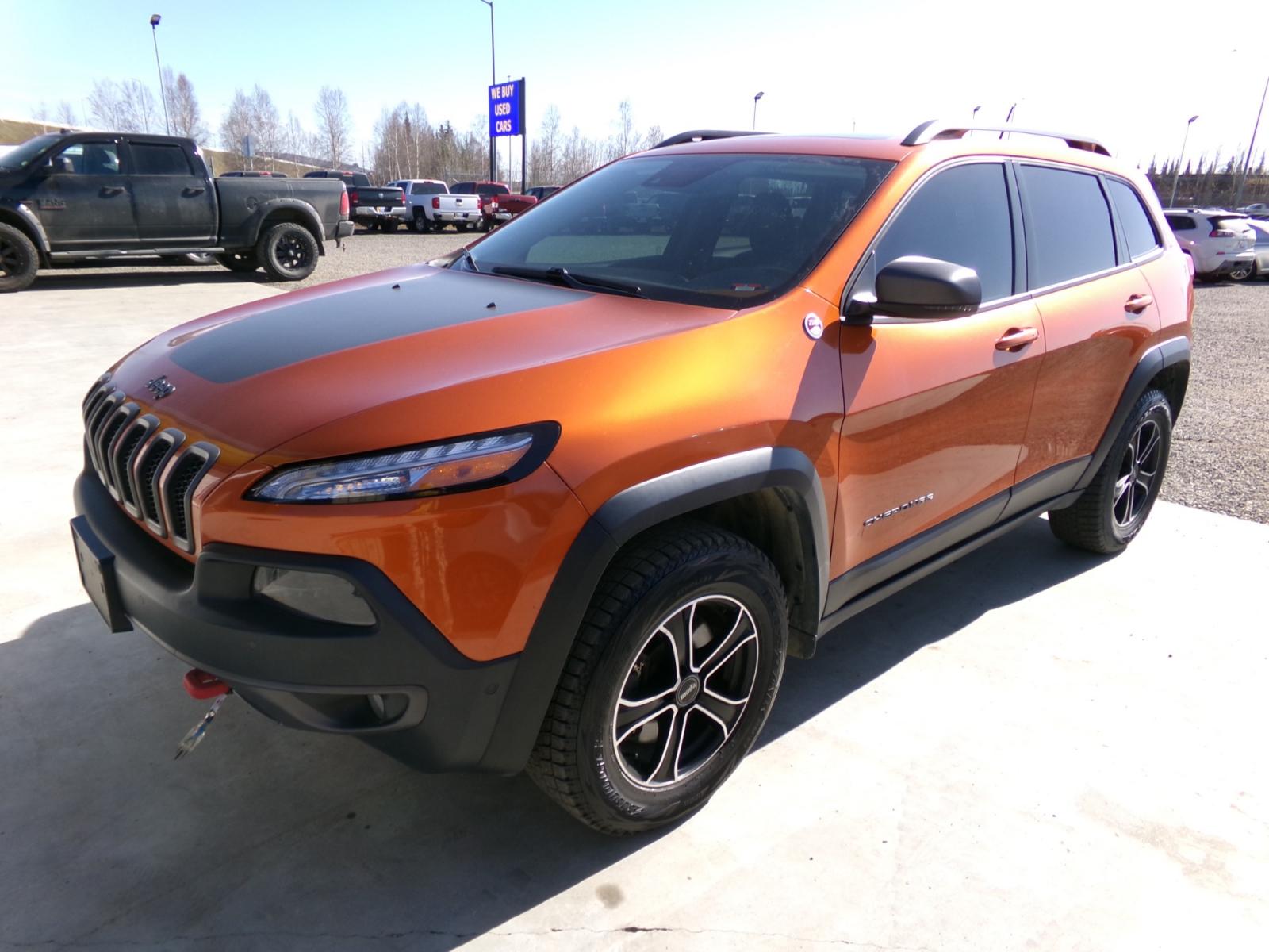 2015 orange Jeep Cherokee Trailhawk (1C4PJMBS1FW) with an 3.2L V6 DOHC 24V engine, 9-Speed Automatic transmission, located at 2630 Philips Field Rd., Fairbanks, AK, 99709, (907) 458-0593, 64.848068, -147.780609 - Photo #0